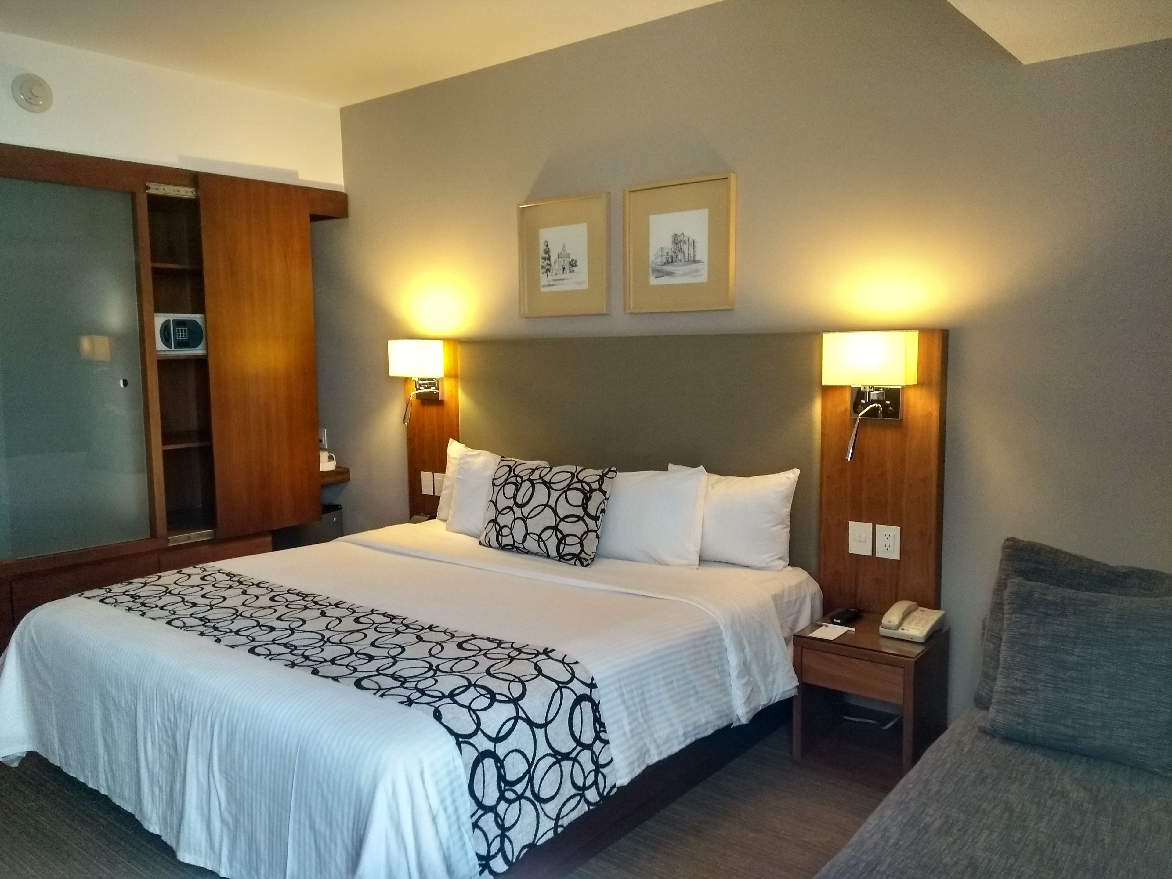 superior room, 1 king bed | premium bedding, down duvets, select comfort beds, in-room safe