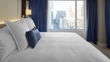Premium bedding, down comforters, pillowtop beds, minibar