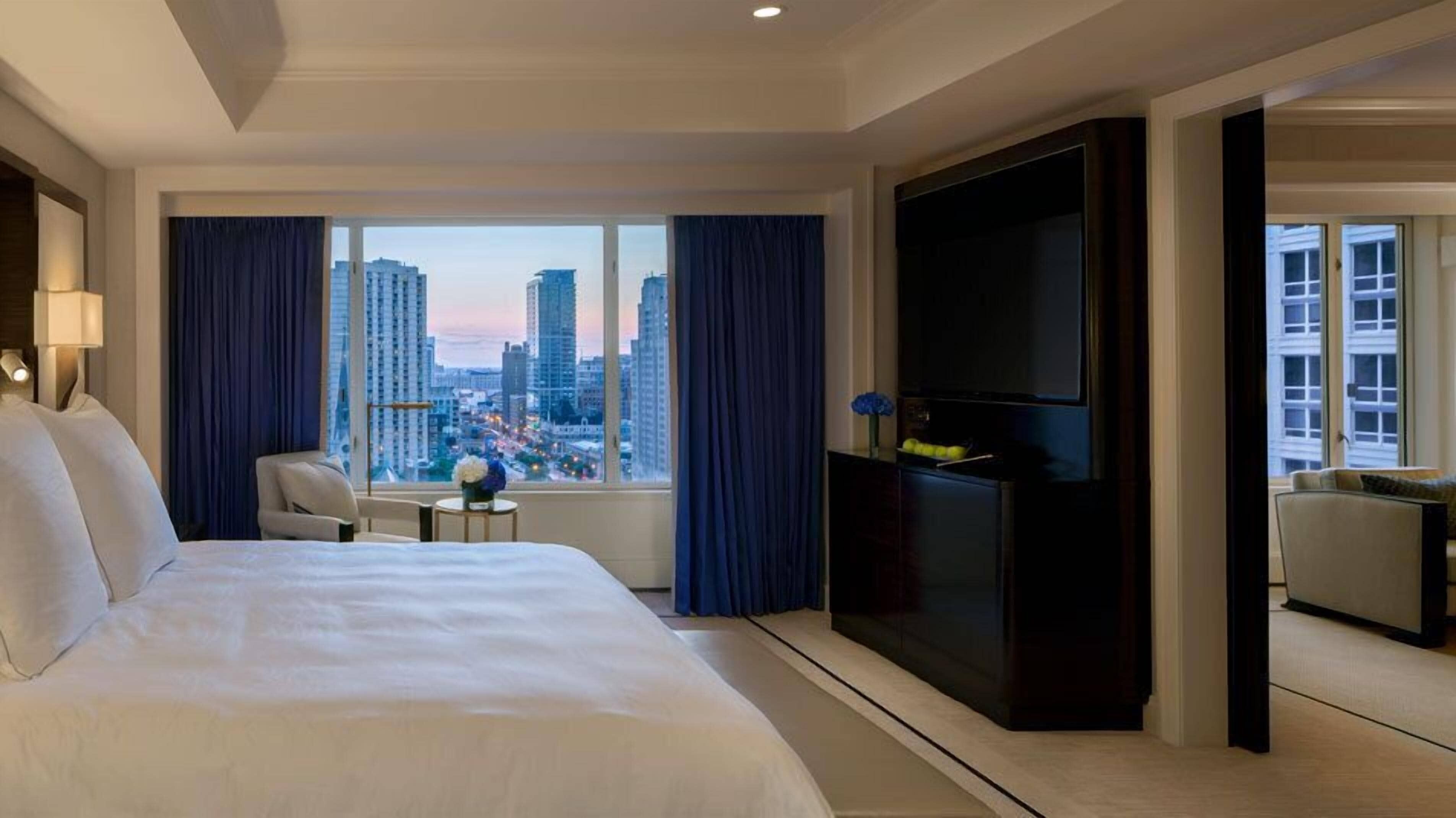 Premium bedding, down comforters, pillowtop beds, minibar