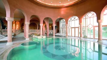 Indoor pool, outdoor pool, pool umbrellas, pool loungers