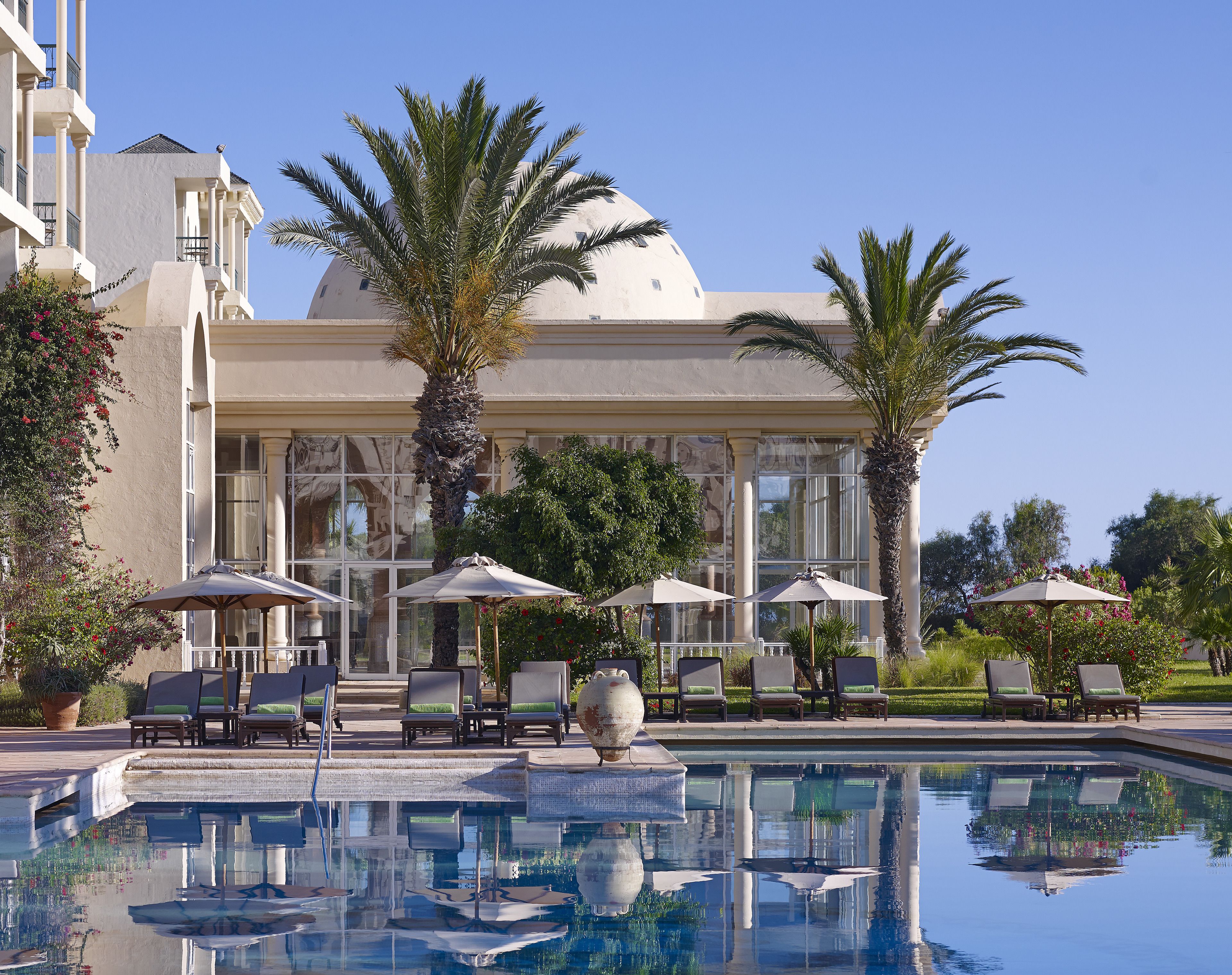 Indoor pool, outdoor pool, pool umbrellas, sun loungers