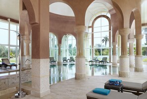 Indoor pool, outdoor pool, pool umbrellas, sun loungers