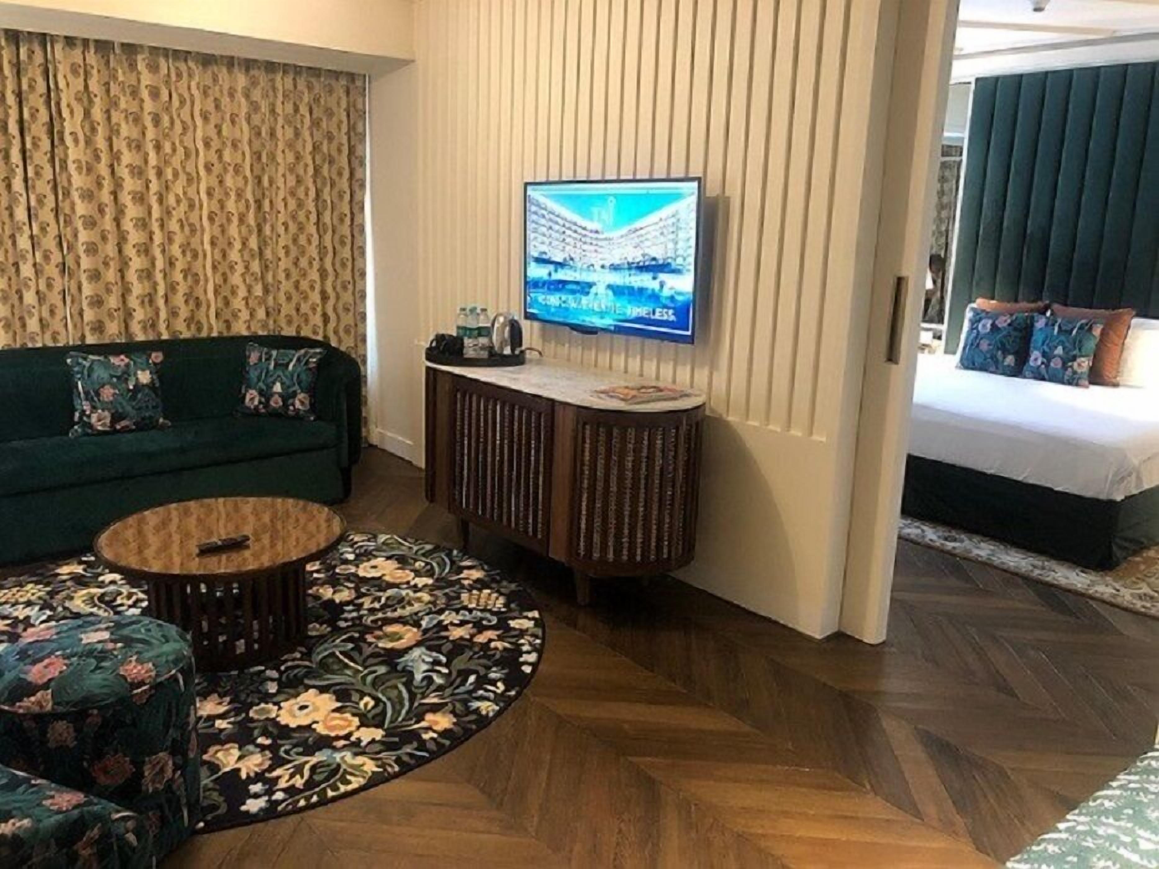 seleqtions suite | living area | 32-inch lcd tv with satellite channels, tv, dvd player