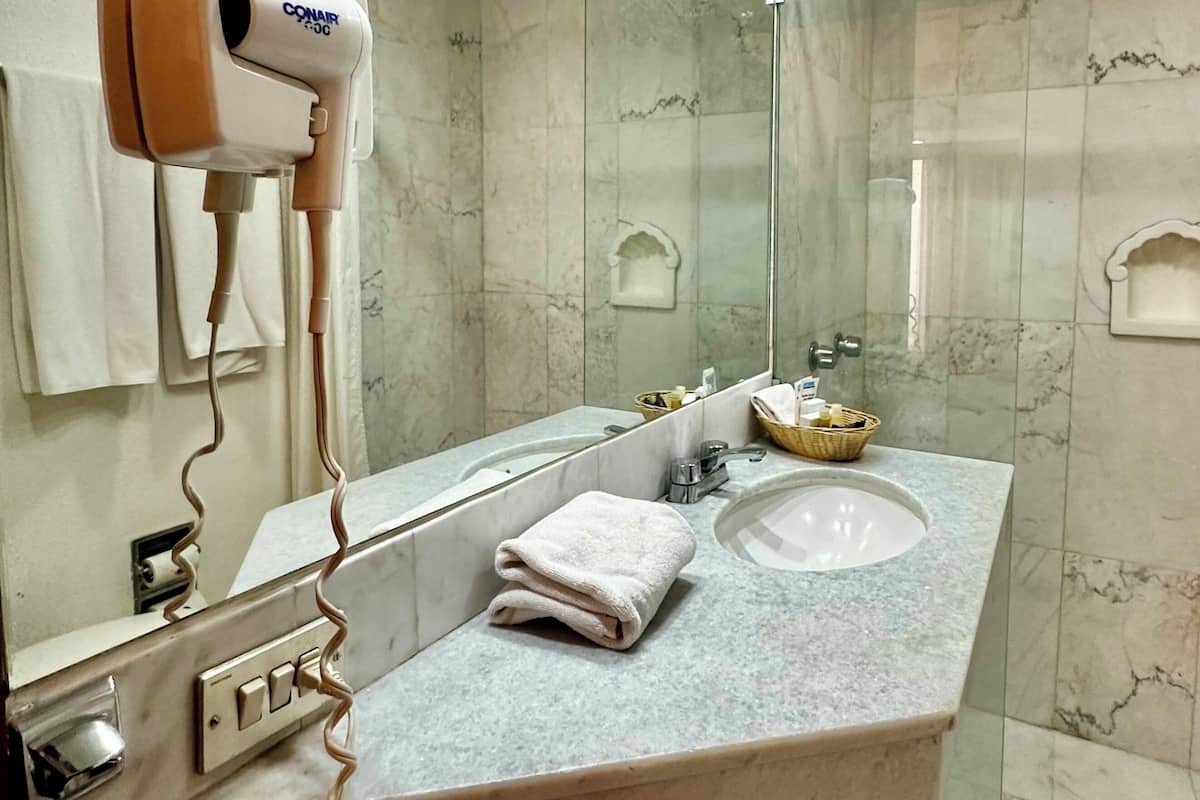 standard room, 1 queen bed | bathroom | designer toiletries, hair dryer, towels, soap