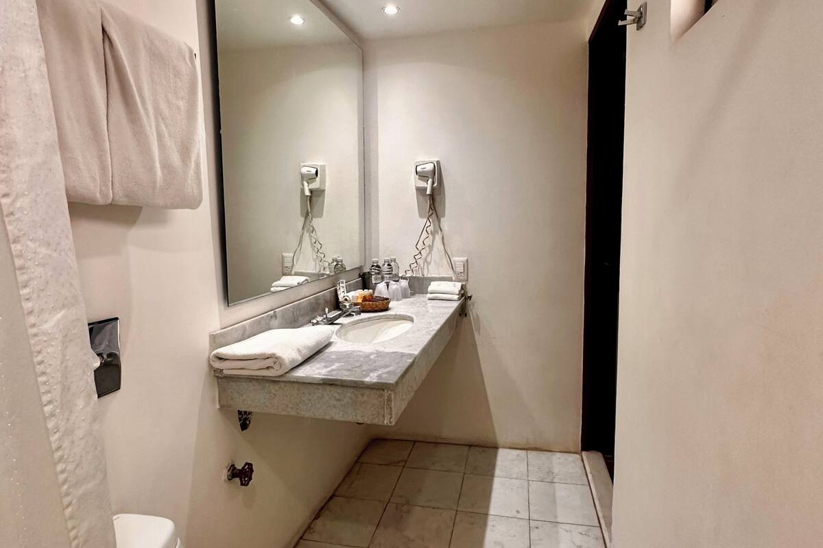 double room, 2 queen beds | bathroom | designer toiletries, hair dryer, towels, soap