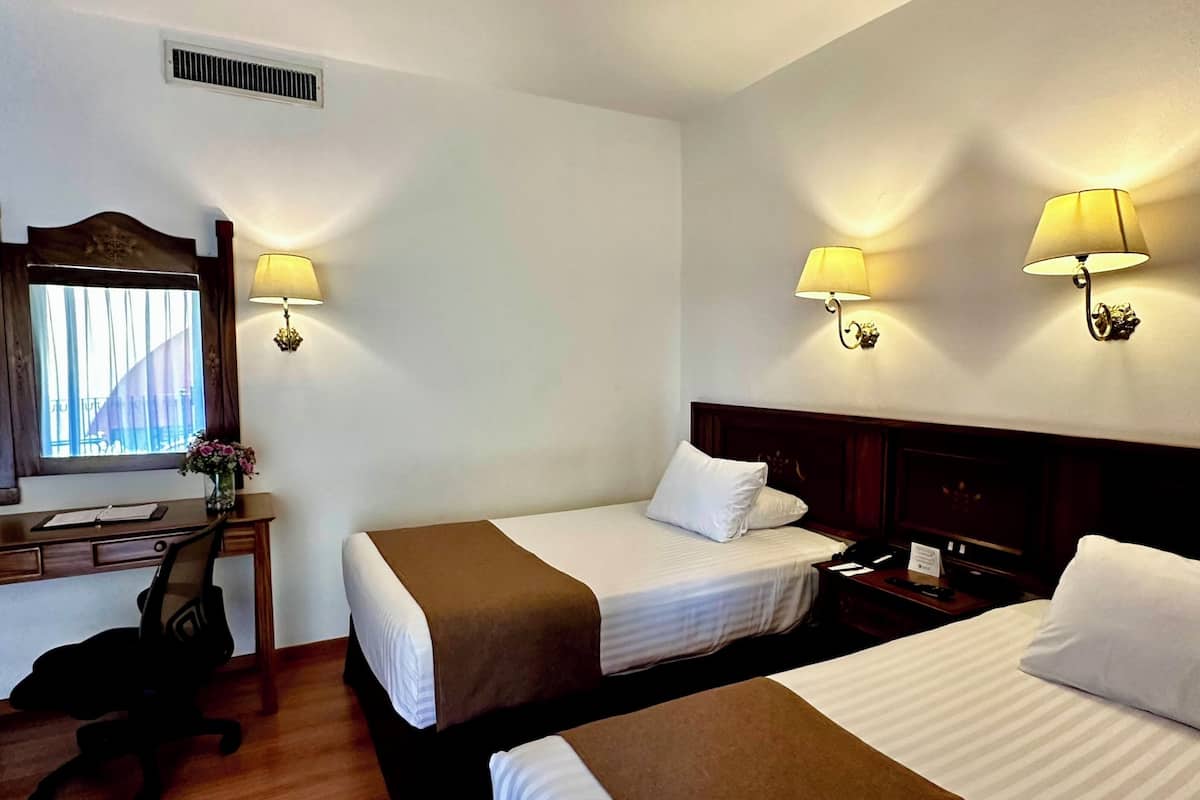 standard twin room | premium bedding, in-room safe, blackout curtains, iron/ironing board