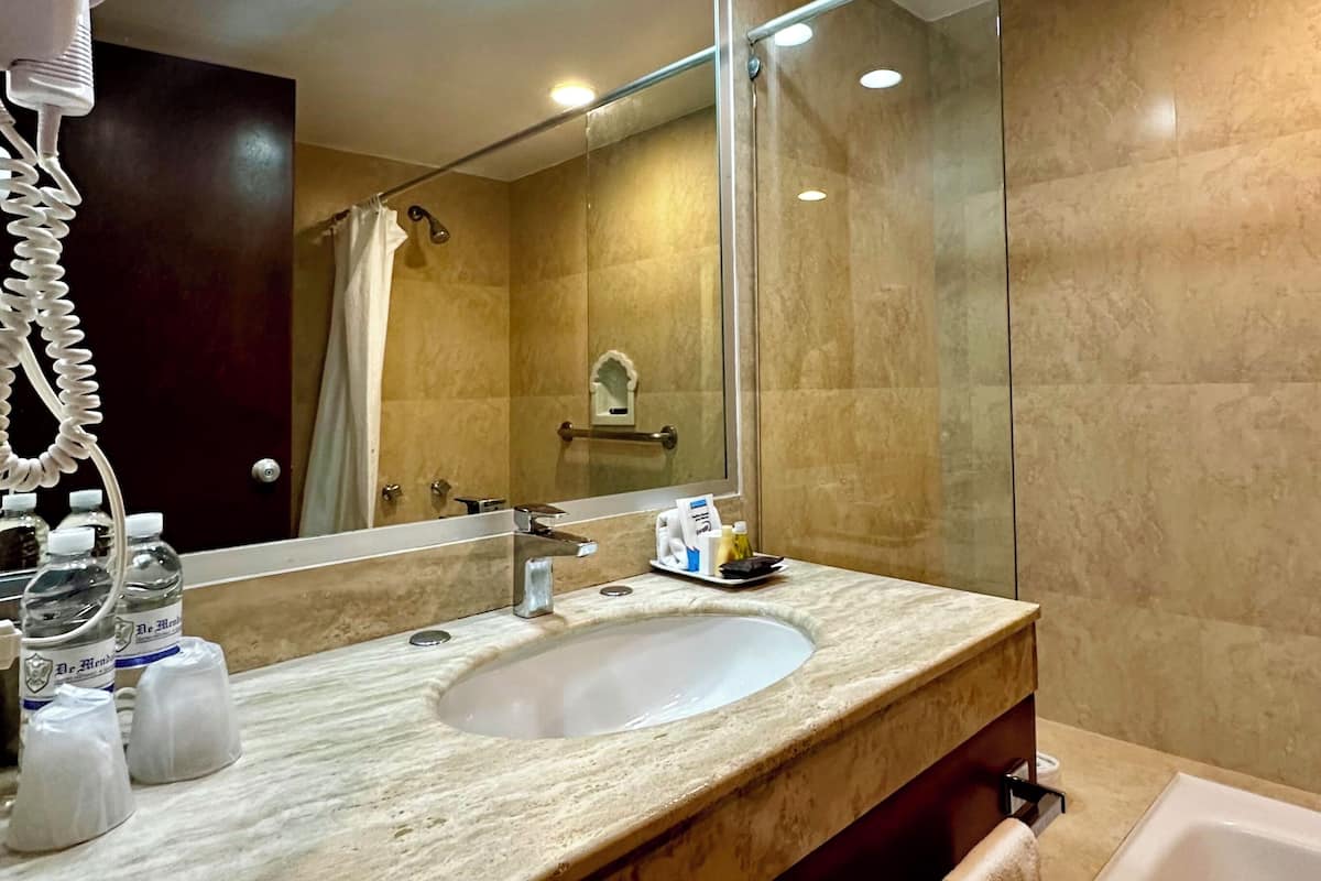 superior room | bathroom | designer toiletries, hair dryer, towels, soap