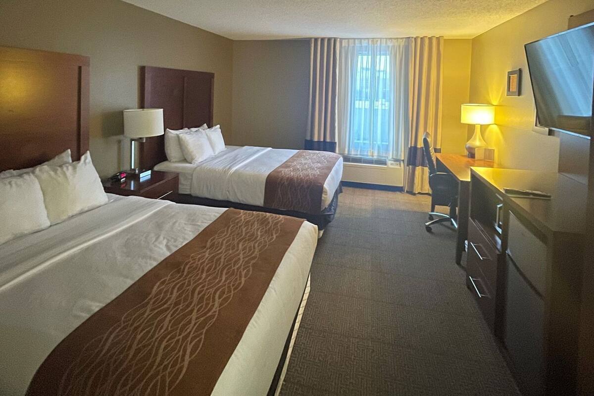 Desk, laptop workspace, blackout curtains, iron/ironing board