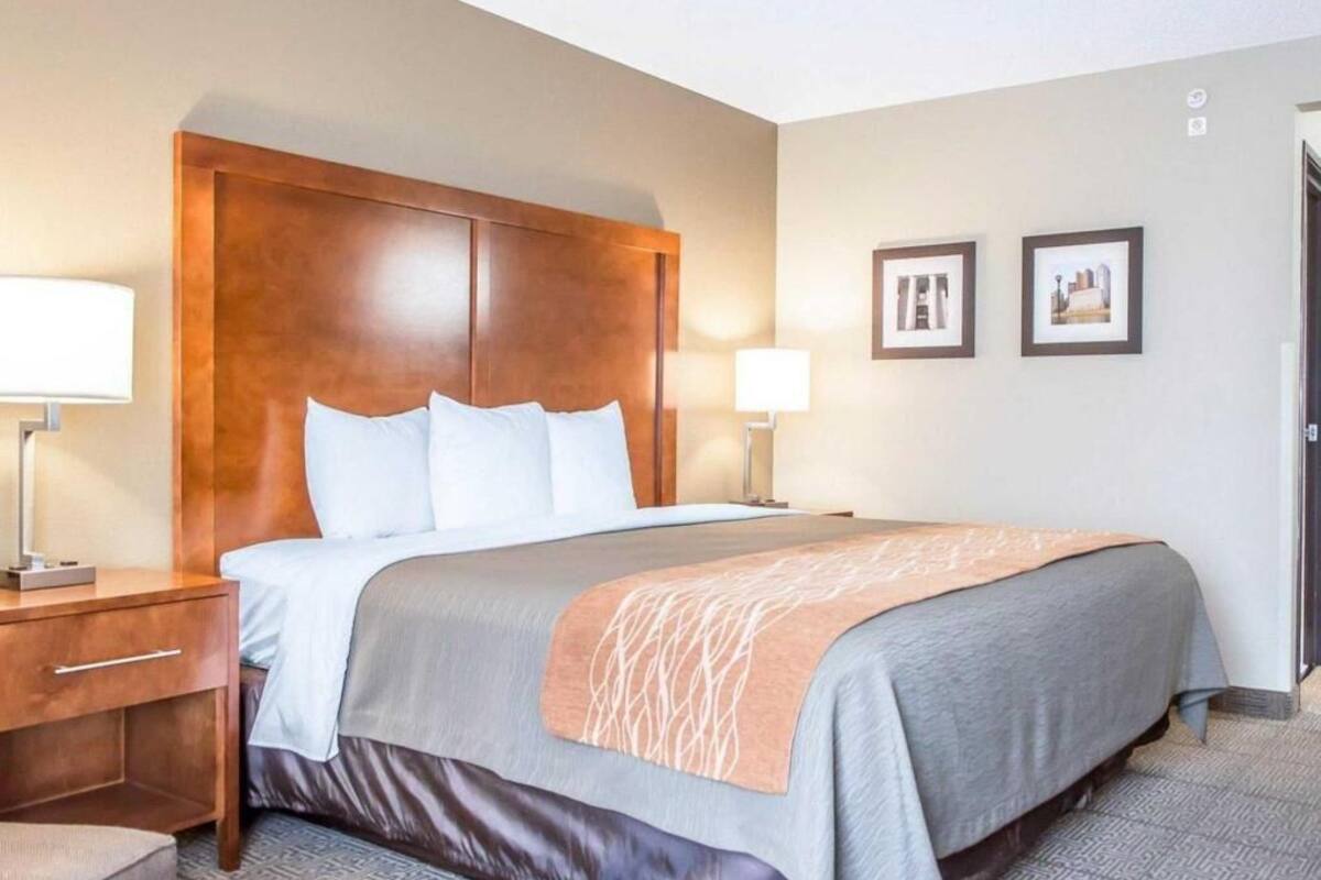 Desk, laptop workspace, blackout curtains, iron/ironing board