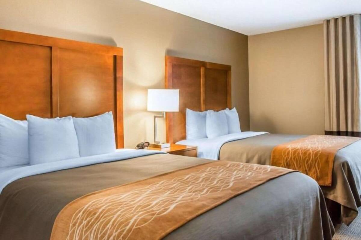 Desk, laptop workspace, blackout curtains, iron/ironing board