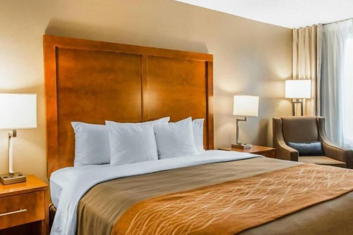 Desk, laptop workspace, blackout curtains, iron/ironing board