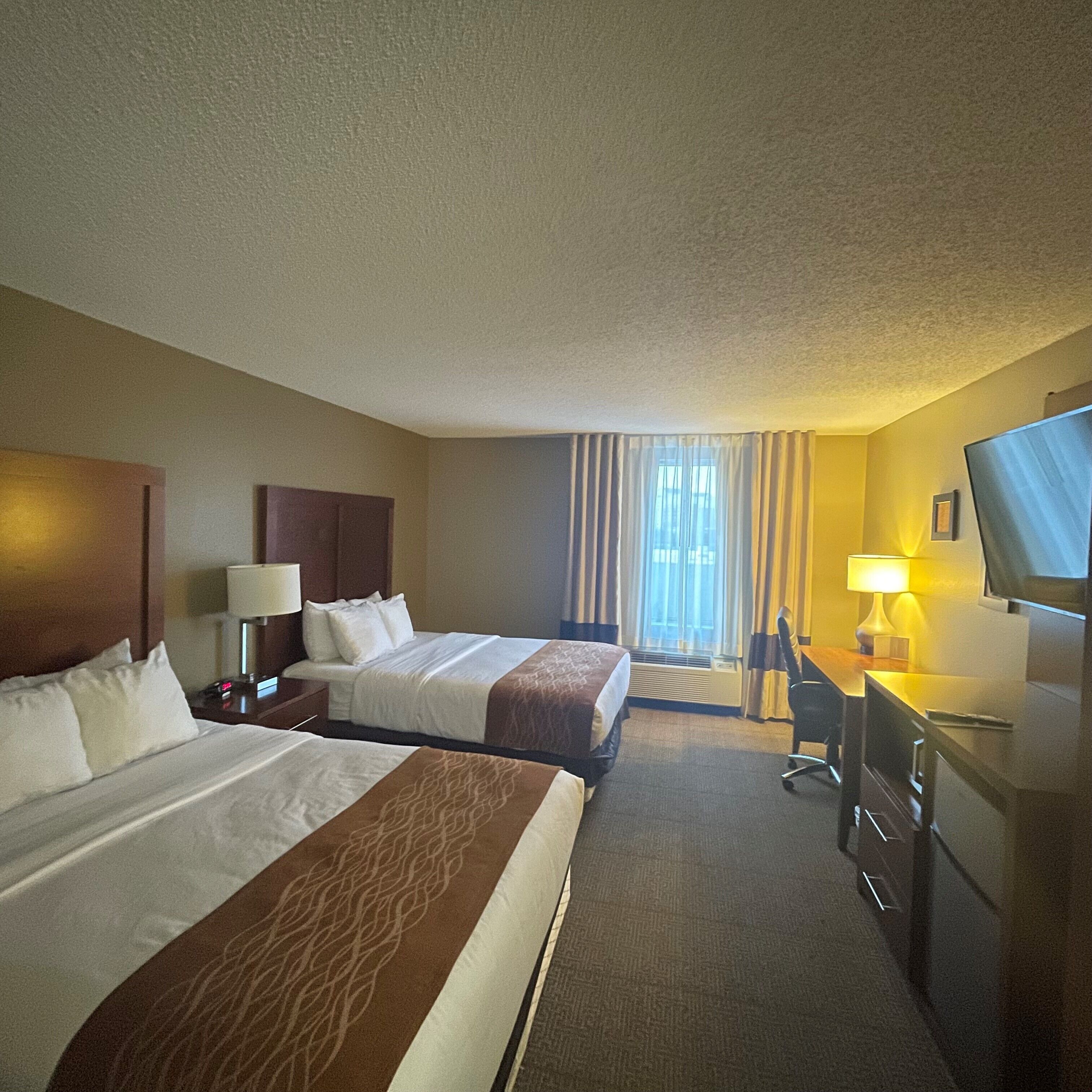 desk, laptop workspace, blackout curtains, iron/ironing board