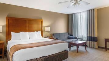 Desk, laptop workspace, blackout drapes, iron/ironing board