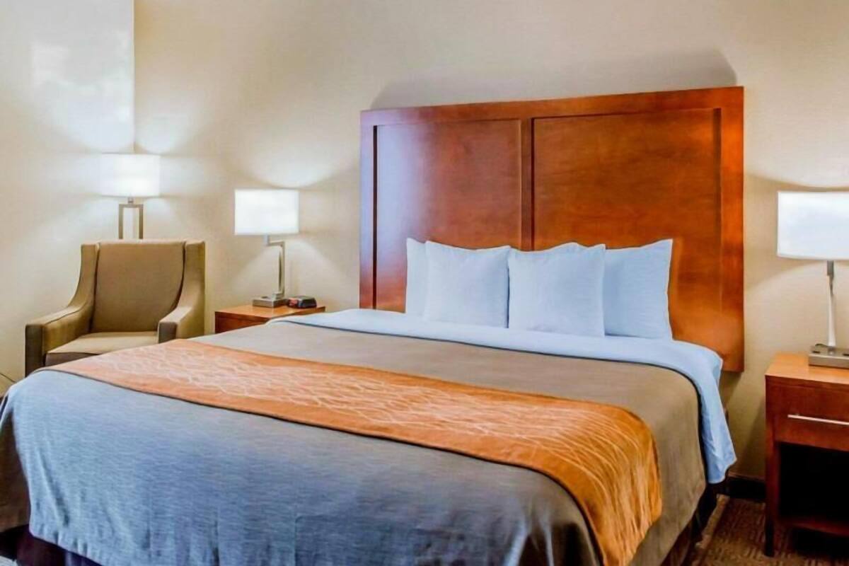 Desk, laptop workspace, blackout curtains, iron/ironing board