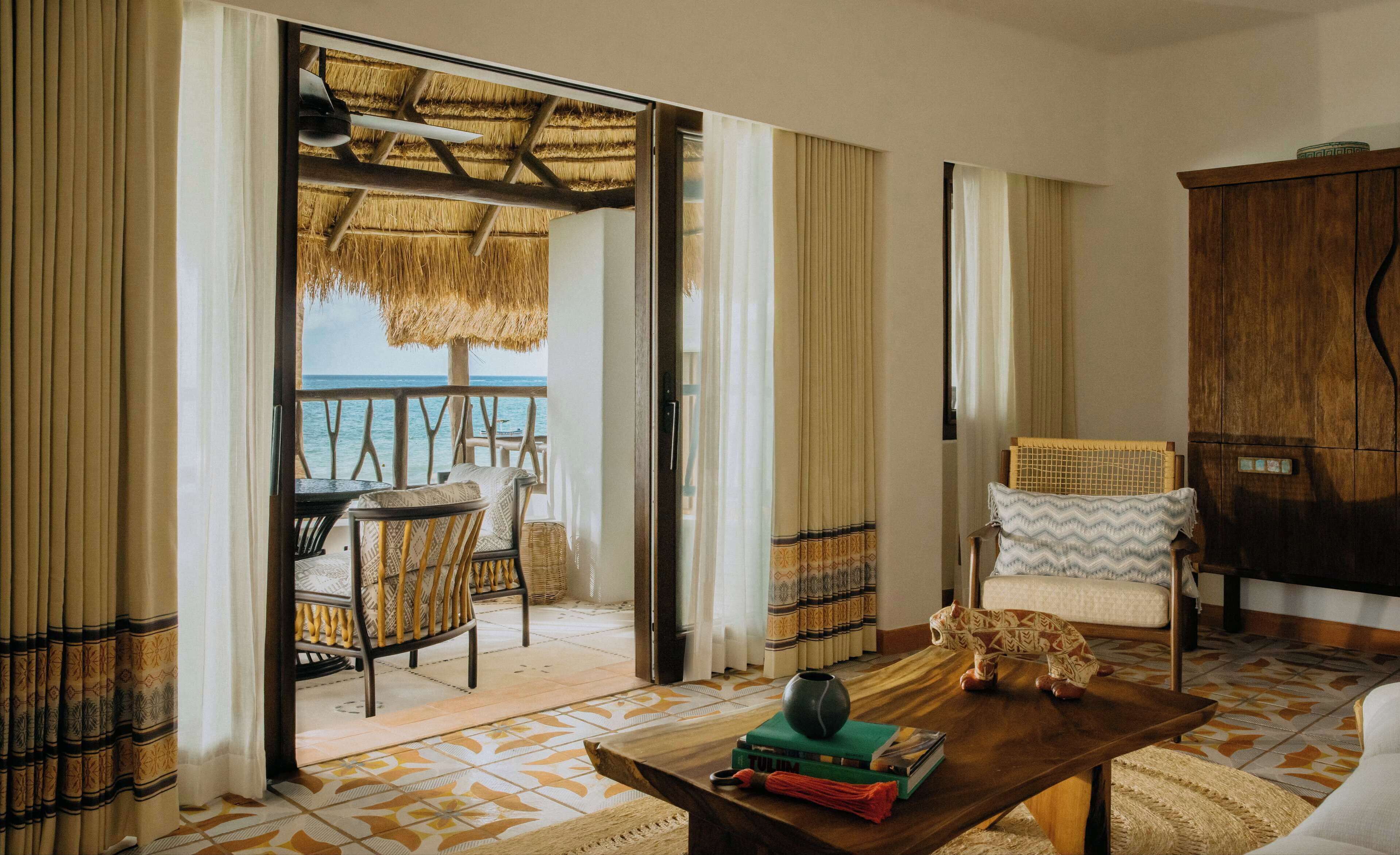 Suite, 1 habitación, frente al océano | Ropa de cama de alta calidad, edredón y minibar 