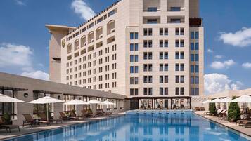 Indoor pool, outdoor pool, pool umbrellas, sun loungers