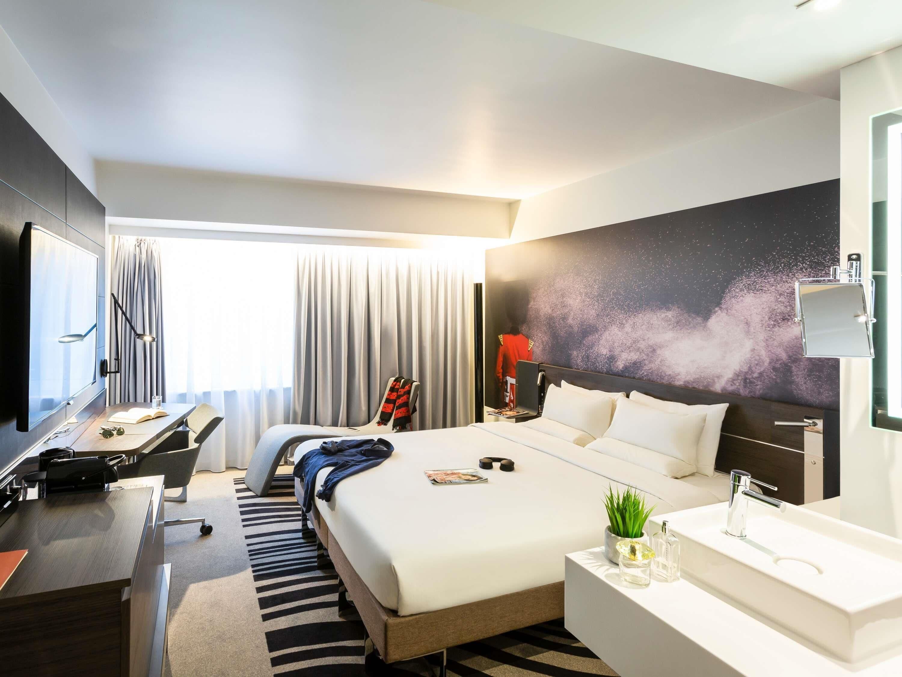 Suite, 1 Queen-Bett und Schlafsofa | Hochwertige Bettwaren, Zimmersafe, Schreibtisch, schallisolierte Zimmer
