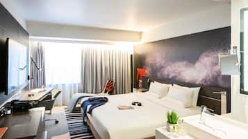 Premium bedding, in-room safe, desk, soundproofing