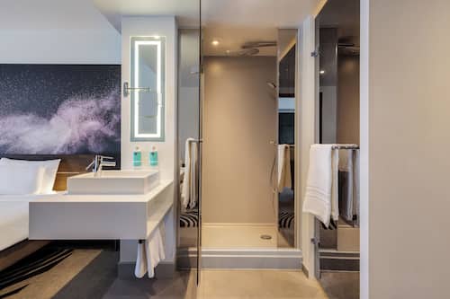 Eco-friendly toiletries, hair dryer, towels