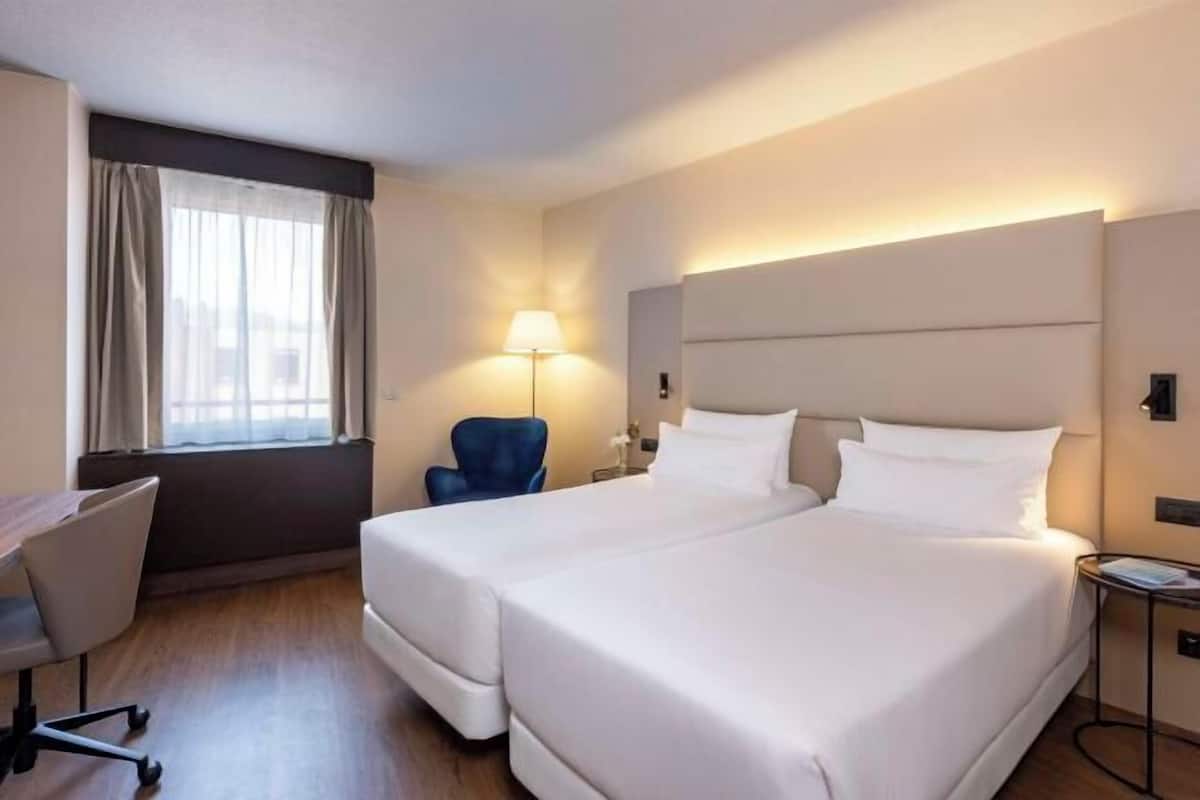 Hypo-allergenic bedding available, minibar, in-room safe, desk