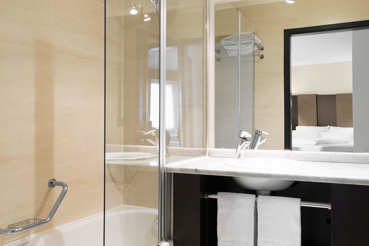 shower, deep-soaking bathtub, rainfall showerhead