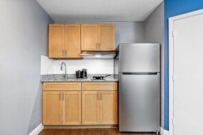 Tabla de planchar con plancha, camas supletorias, wifi gratis