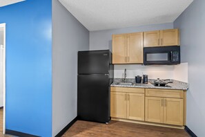 Fridge, microwave, stovetop, coffee/tea maker