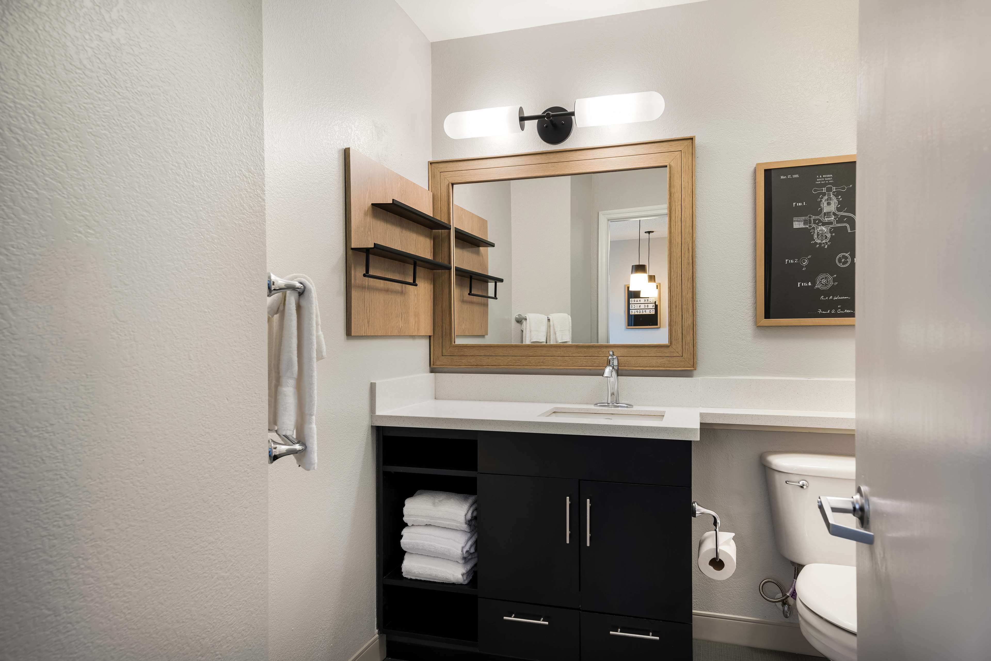 combined shower/bathtub, deep-soaking bathtub, hair dryer, towels