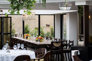 4 restaurants, breakfast, lunch, dinner served; Indian cuisine 