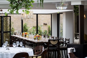 4 restaurants, breakfast, lunch, dinner served; Indian cuisine
