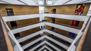 A multi-level atrium with a modern design, featuring a central open space and multiple floors. - Clarion Hotel Copenhagen Airport (Kastrup)
