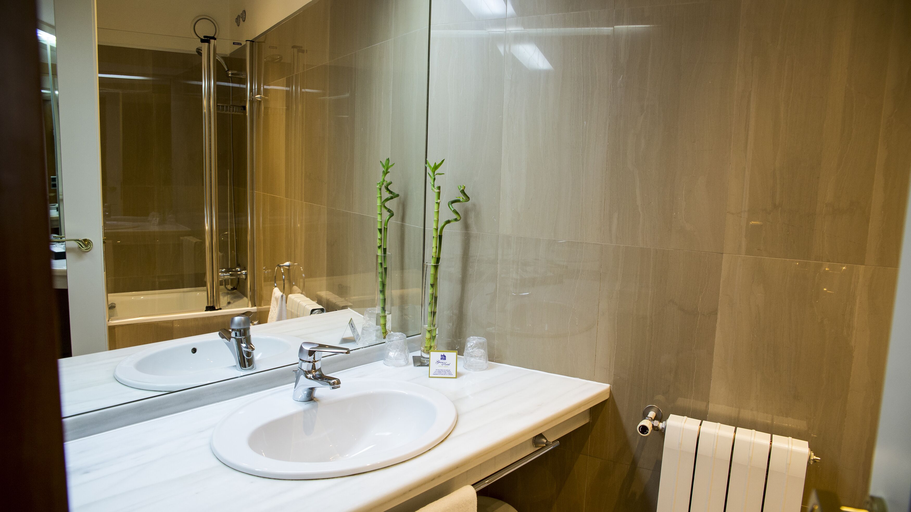 junior suite, 1 king bed, balcony, city view (mini) | bathroom | combined shower/bathtub, free toiletries, hair dryer, bidet