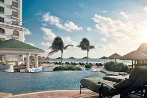 Luxury Suite, 1 King Bed with Sofa bed, Balcony | Pool | Indoor pool, 3 outdoor pools