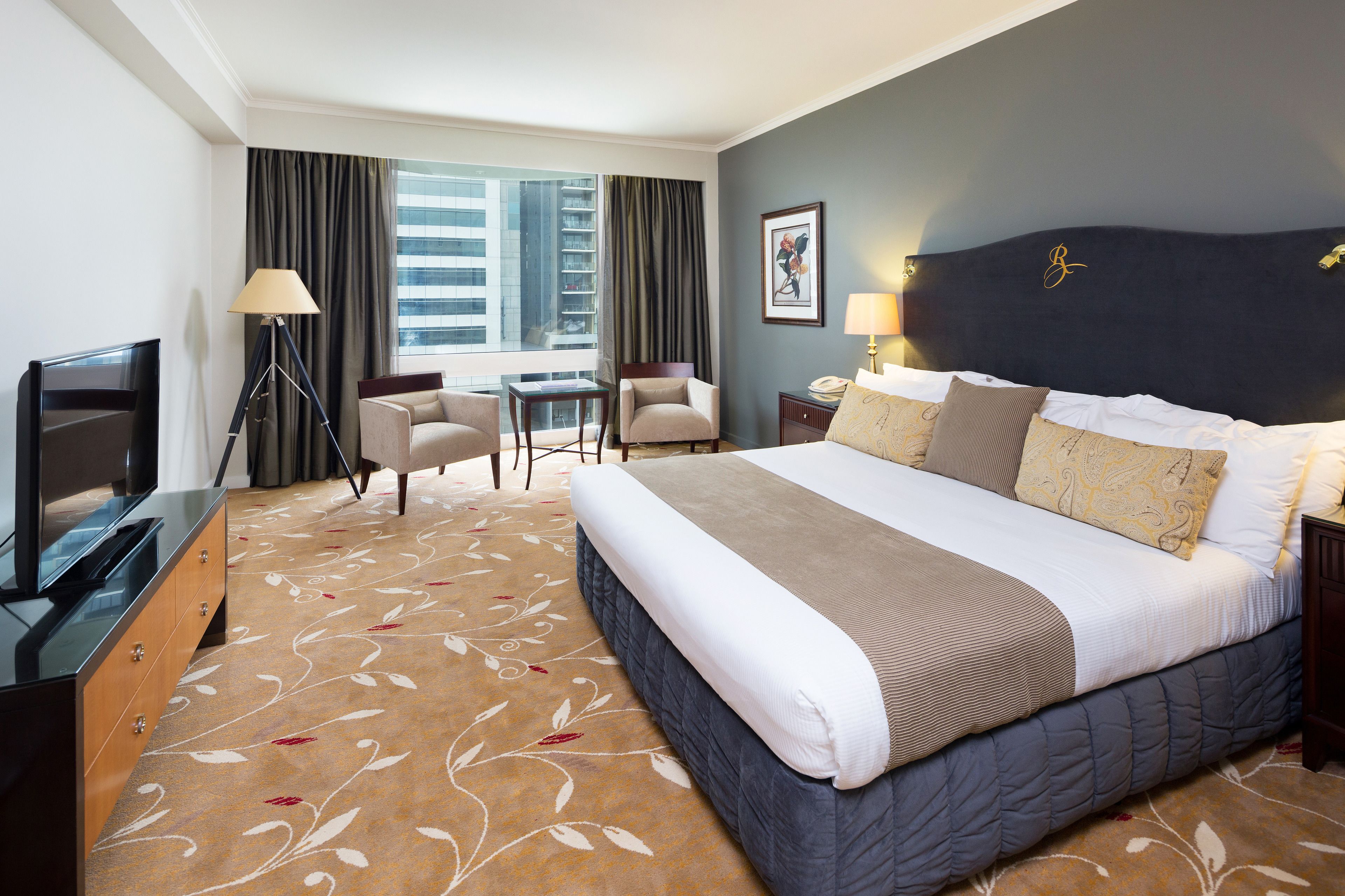 deluxe spa suite - inc. bottle of sparkling wine and complimentary self parking | 1 bedroom, in-room safe, desk, blackout curtains