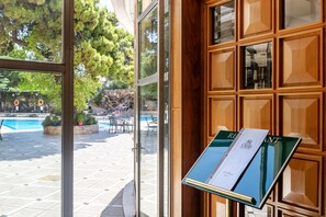 Breakfast, lunch, dinner served; international cuisine, pool views