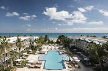 Outdoor pool, cabanas (surcharge), pool umbrellas at The Ritz-Carlton, South Beach