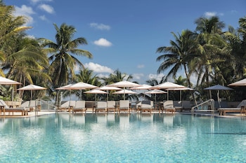 Outdoor pool, cabanas (surcharge), pool umbrellas at The Ritz-Carlton, South Beach
