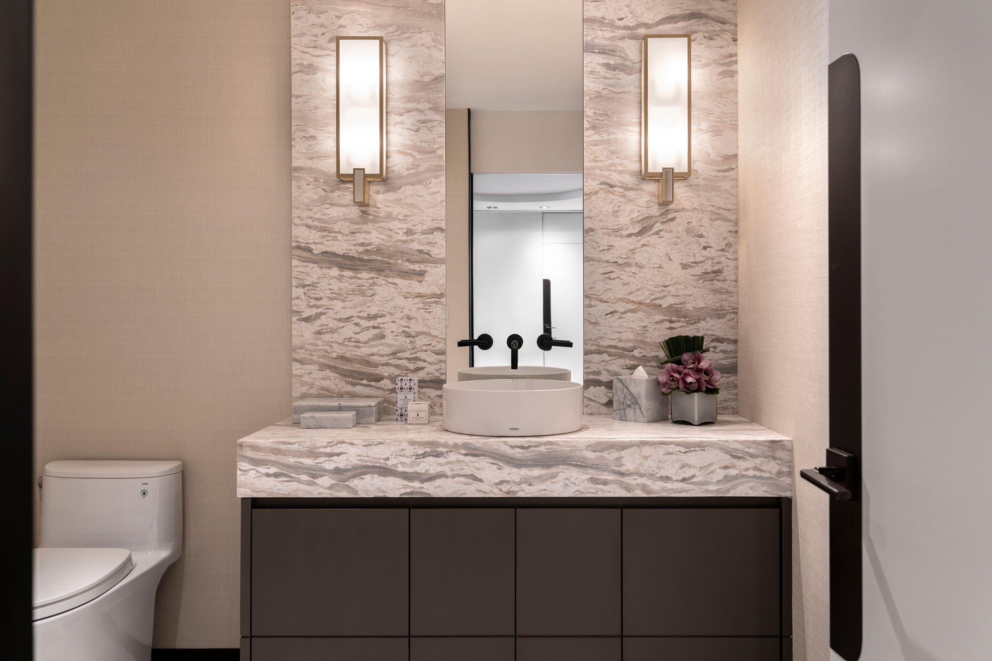 the ritz-carlton suite | bathroom | separate bathtub and shower, deep-soaking bathtub, designer toiletries