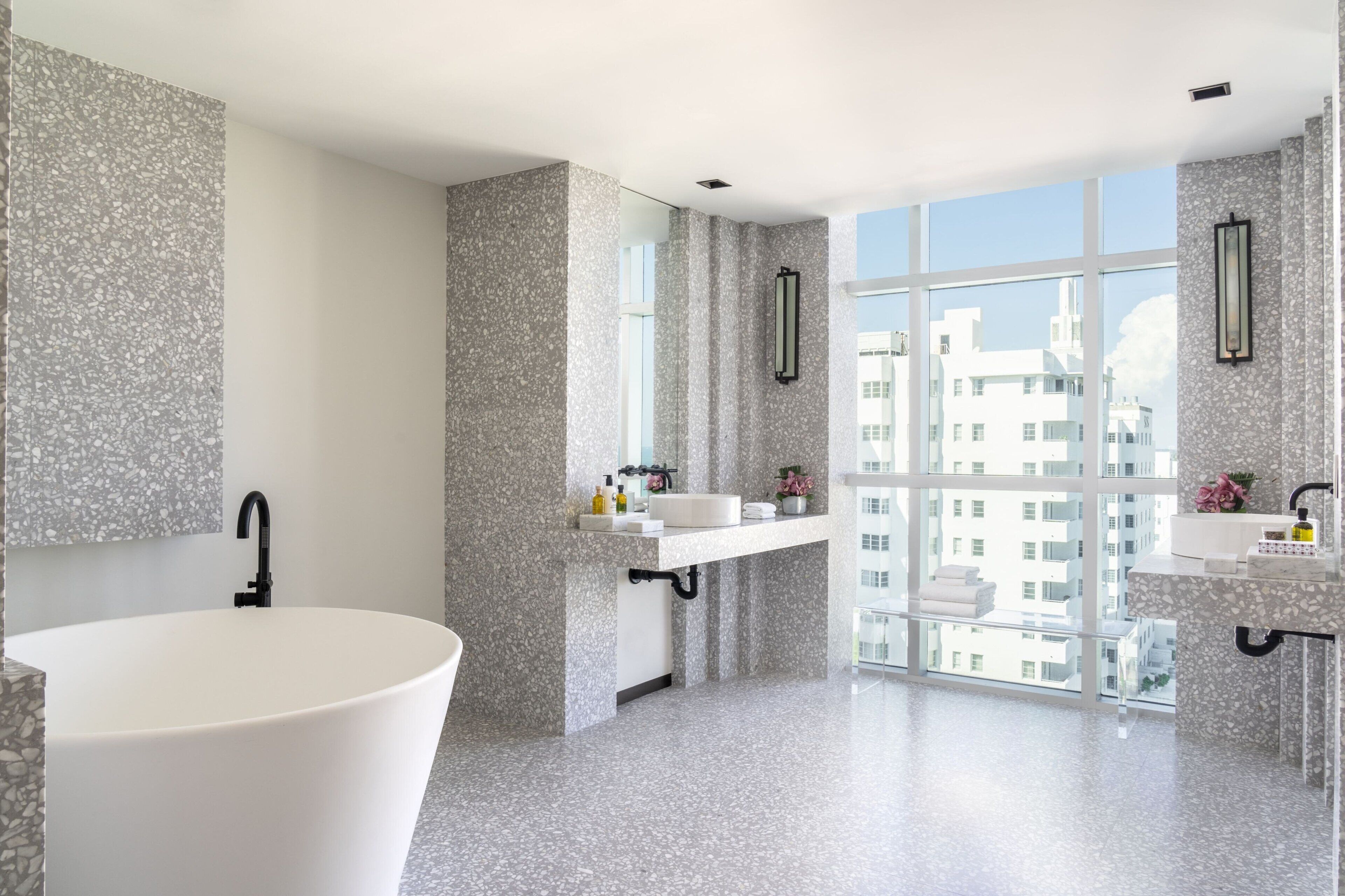 the ritz-carlton suite | bathroom | separate bathtub and shower, deep-soaking bathtub, designer toiletries