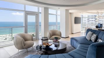 The Ritz-Carlton Suite | Living room | 37-inch Smart TV with cable channels, TV, Netflix