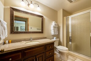 Hair dryer, towels, soap, shampoo