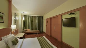 Ropa de cama de alta calidad, minibar, caja fuerte y escritorio