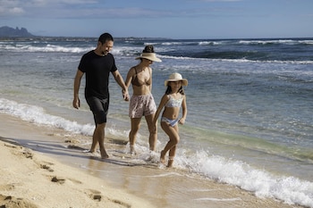 On the beach, beach towels, beach massages at OUTRIGGER Kauaʻi Beach Resort & Spa