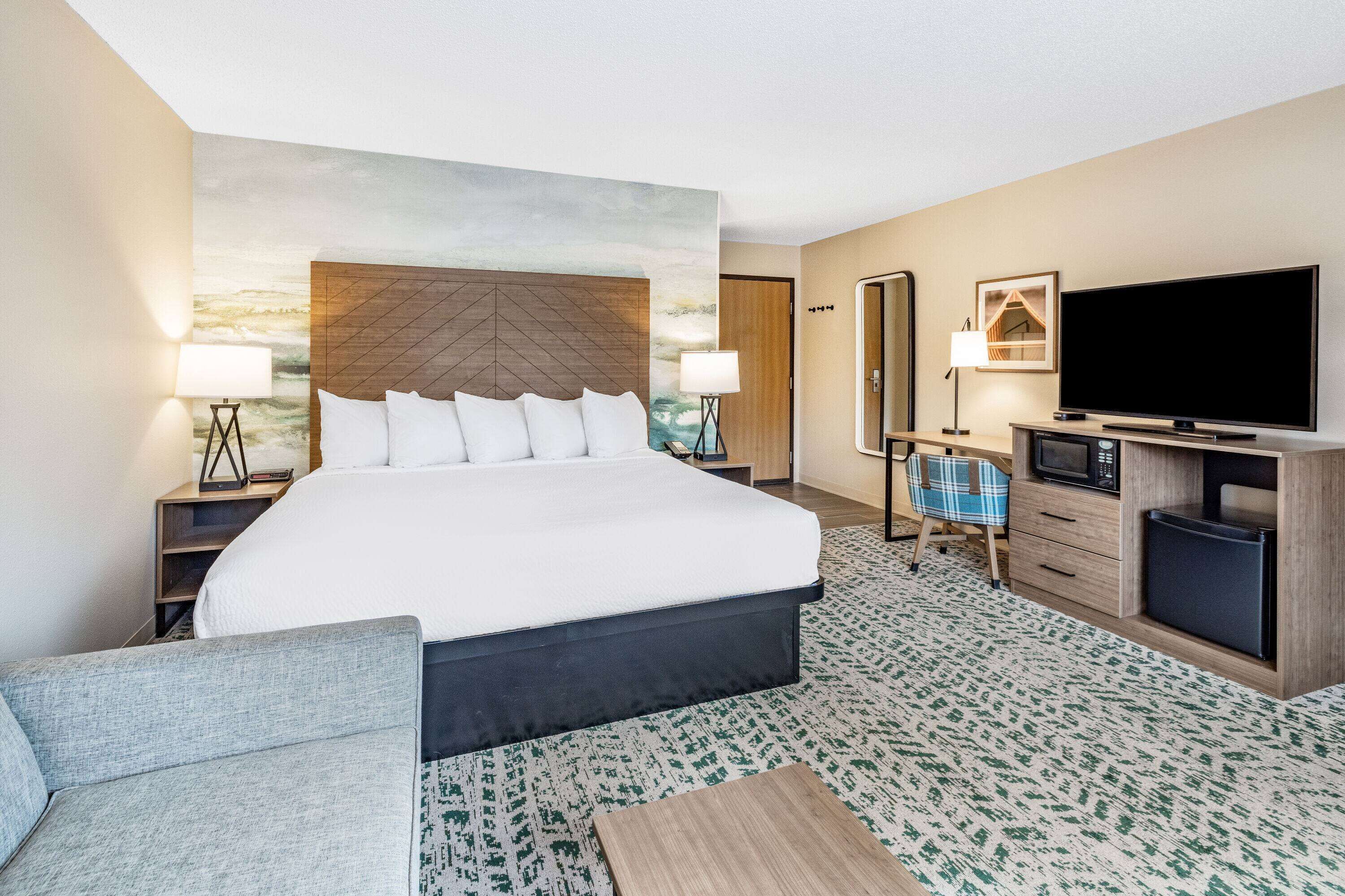 suite, multiple beds, non smoking | desk, blackout curtains, iron/ironing board, rollaway beds