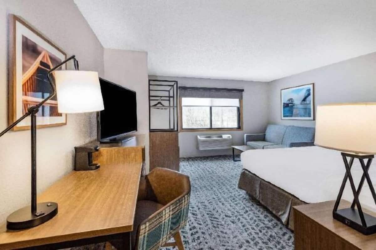 Desk, blackout drapes, iron/ironing board, rollaway beds