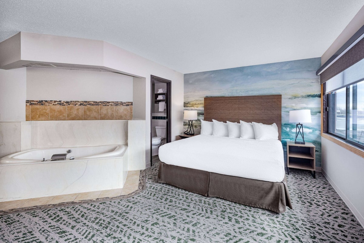 superior suite, 1 king bed, non smoking (second floor, one bedroom) | desk, blackout curtains, iron/ironing board, rollaway beds