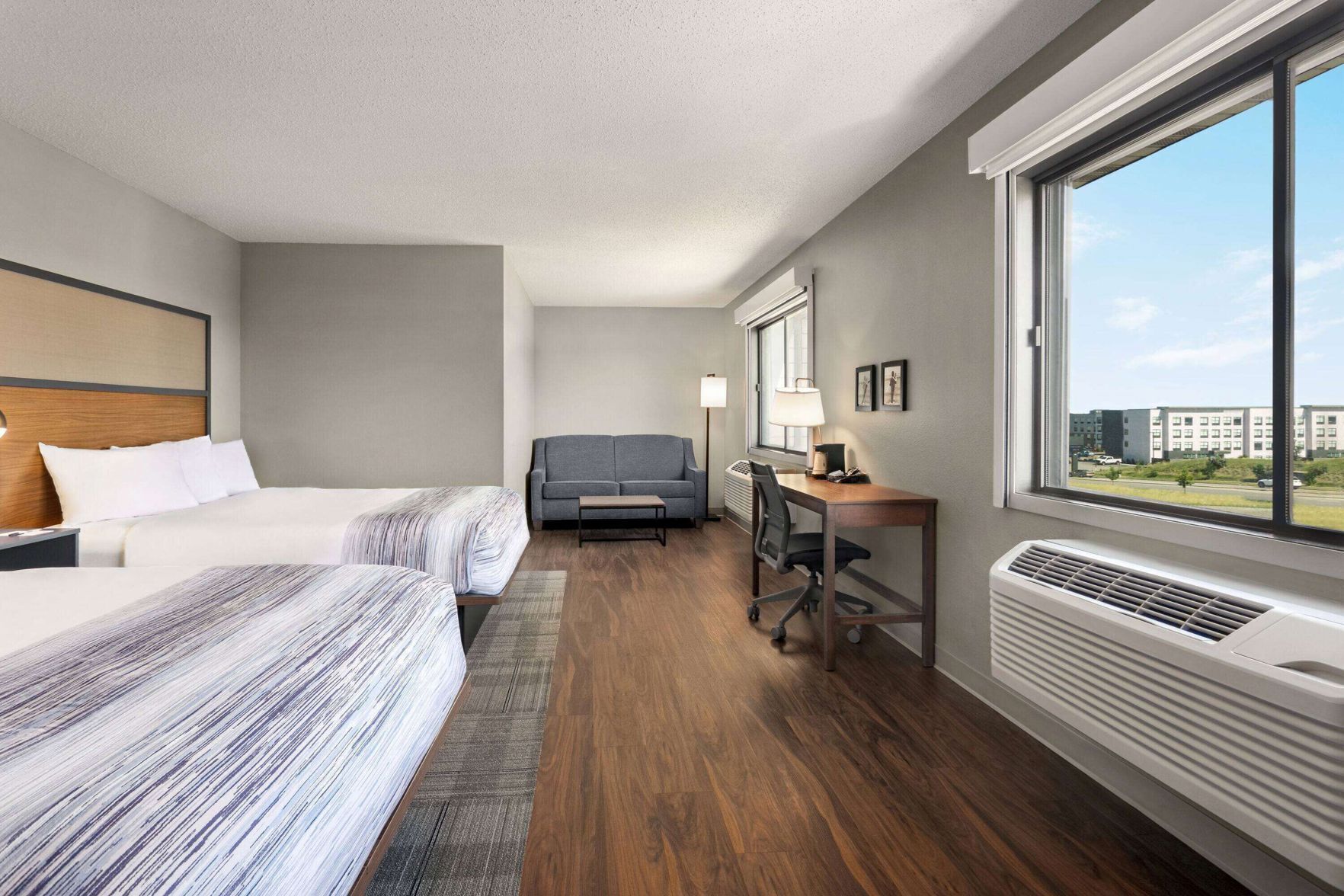 Desk, laptop workspace, blackout drapes, iron/ironing board