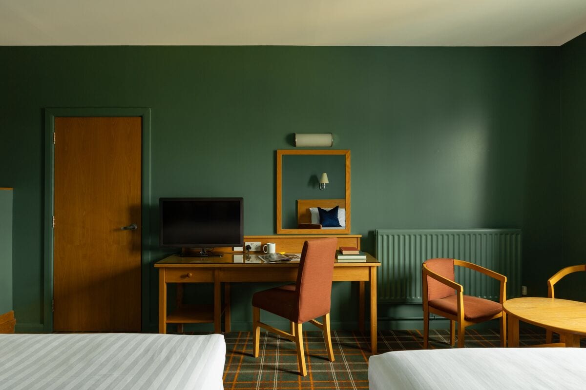 premium bedding, desk, free cots/infant beds, free wifi