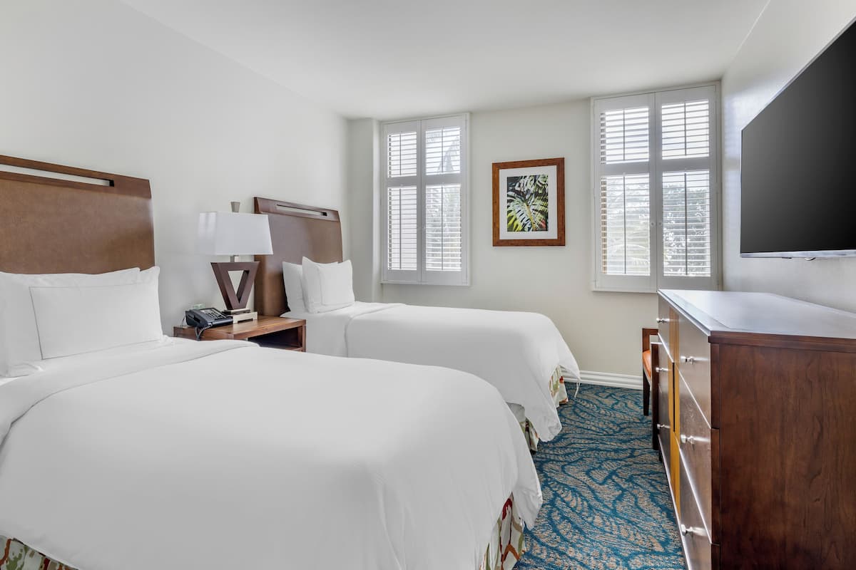 Premium bedding, pillow-top beds, in-room safe, blackout curtains