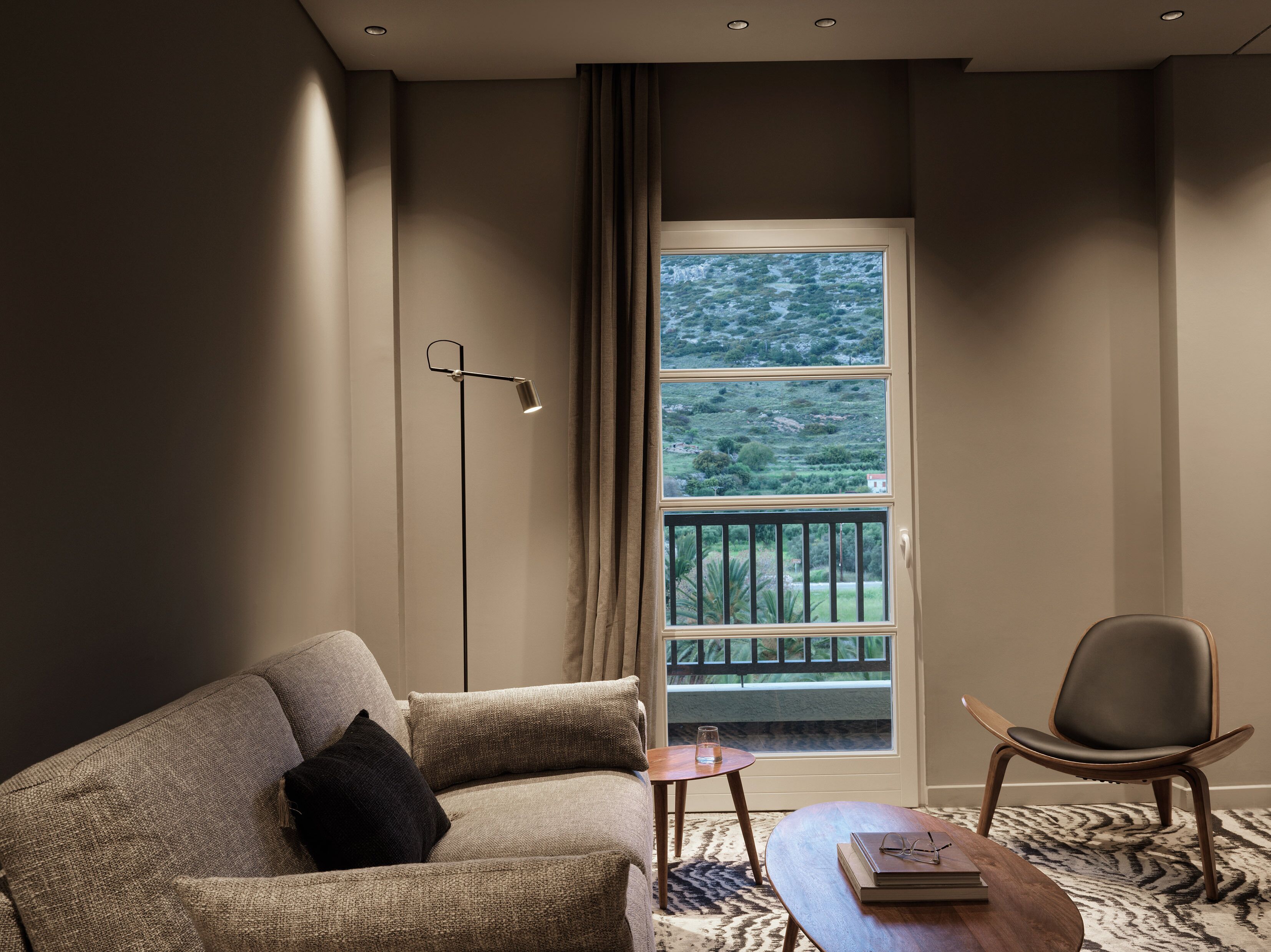 deluxe suite with garden view | living area | 42-inch lcd tv with satellite channels, tv, pay films